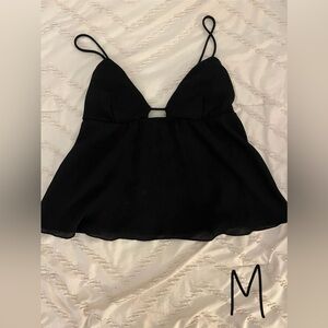 All tops are $8 each or 3 for $20. With sizes in the bottom right corner